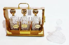 Modern gilt glass, brass and wooden tantalus, having three gilt glass square-section spirit