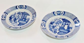 Pair Chinese blue and white porcelain plates, decorated with figures on veranda watching flying