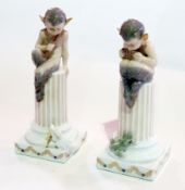 Royal Copenhagen porcelain model of a faun, seated on column with lizard, and another of a faun