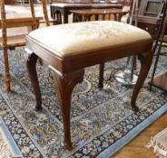 Reproduction Georgian mahogany stool, the top upholstered in floral embroidery, quadrant mould edge,