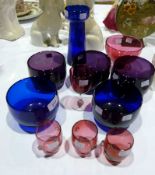 Various coloured glass bowls, cranberry glass cups and other items (11)