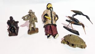 A mixed lot of collectables to include:- various carved figures, various brass animals and an