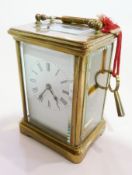 A French carriage clock timepiece, in glazed brass case, with enamel dial, height 11cm