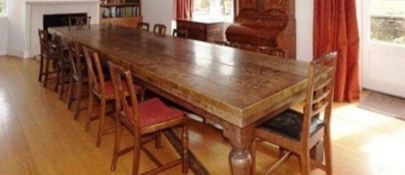 Early 20th century oak six-plank top refectory dining table, rectangular and brass-bound, on