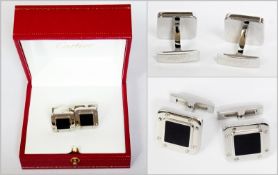 Pair Cartier silver and black onyx gentleman's cufflinks, square, each inset with rectangular