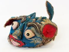 Oriental silk embroidered hat in the form of horned face, with applied ears, eyes and nose and