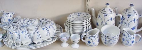 Furnivals Denmark pottery part tea and dinner service, decorated in blue, and a quantity of eggcups