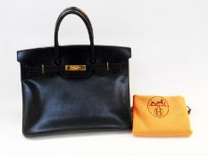 Hermes 'Birkin' bag, in black leather, gilt metal fastenings, padlock on leather strap, blind