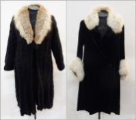 A long mohair coat with a fox fur collar and a black velvet coat with  white fur collar and cuffs (
