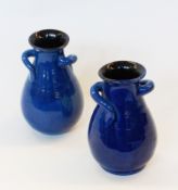 Two Arts & Crafts Liberty vases, of squat form, with small handles, in dark blue glaze (2)