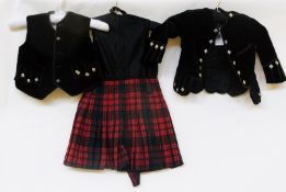 A child's velvet kilt jacket, together with the quilted dress and waistcoat, a child's Liberty style