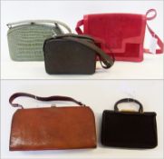 Various vintage handbags, a red suede and leather shoulder bag, a leather fixed frame handbag, two