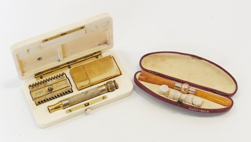 Cased shaving set within a bone (possibly ivory) case, with a amber and gold-coloured metal