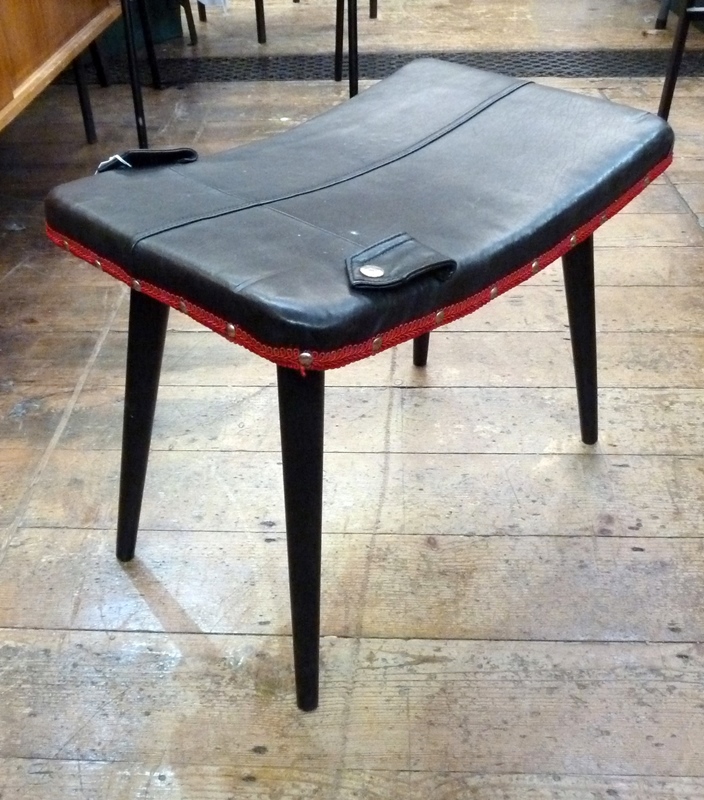 Modern leather upholstered stool, leather top with painted wood supports