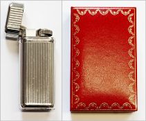Cartier plated lighter, rectangular and ribbed, in original case