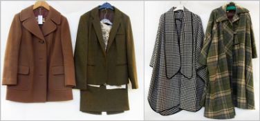 A green wool suit with matching blouse, an Eastex brown overcoat, a Miss Smith black and white dog