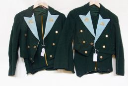 Two green wool uniforms, possibly theatrical, the revers of the collars in pale blue embroidered
