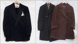 A gentleman's dinner suit including trousers and waistcoat, a Crombie coat, and a green wool coat