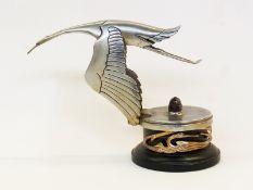 Hispano Suiza stork car mascot by Bazin, signed F. Bazin to base, mounted on circular wooden