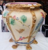 Minton style majolica jardiniere, of baluster form, the turned top with honey flowerheads, the