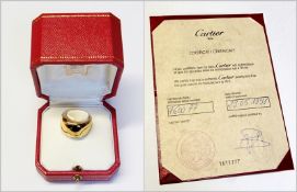 Cartier 18ct gold ring, of plain broad band form, dated 1997 and engraved "Cartier no. F60077",