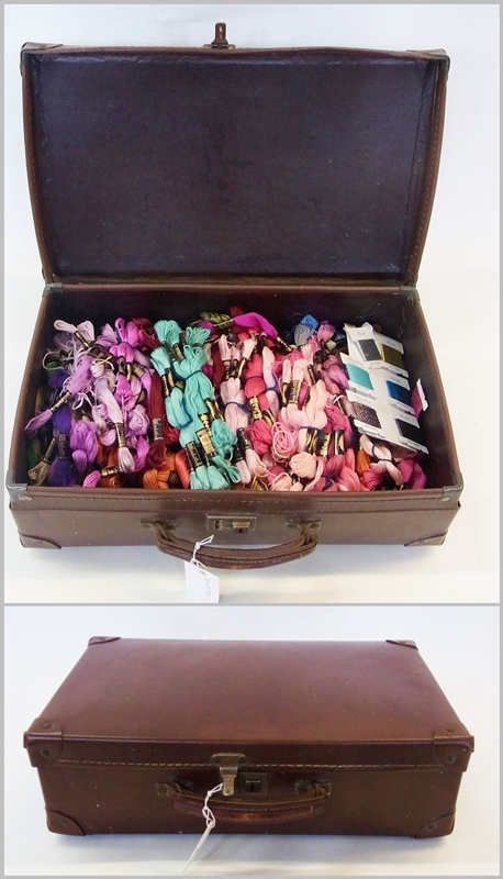 Small leather case containing a very large quantity of embroidery silks, made by Anchor, all in