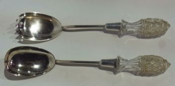 A pair of silver salad servers with cut glass handles, Chester 1902