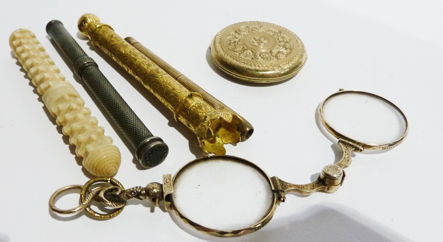 Ivory carved needle case, a rolled gold locket, two propelling pencils, pince nez and a gilt