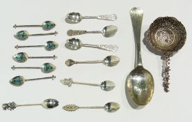 Quantity of foreign silver to include sifter spoon, serving spoon, tea and coffee spoons etc.