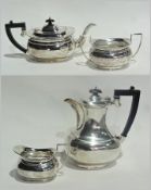 George V silver tea/coffee service of plain form, comprising coffee pot, teapot, sugar basin and