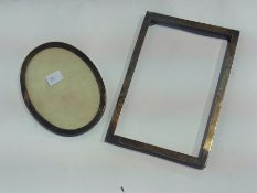 Rectangular silver photograph frame, Birmingham 1922 together with an oval silver photograph