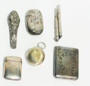 Two silver vesta cases, sovereign case, silverplate vesta case, two propelling pencils, and