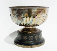 A Victorian silver bowl, with gadrooned border, spiral fluted body, raised on a circular foot,
