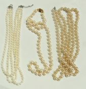 Modern pearl triple-strand necklace and two costume pearl necklaces (3)