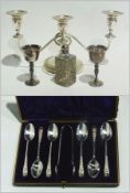 Six-piece silver plate canteen of cutlery, in fitted case, three light candelabrum with scroll