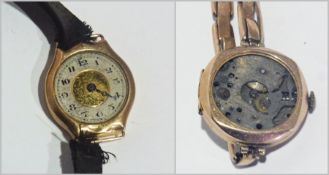 An early twentieth century lady's nine carat gold wrist watch on a band with another, a dial missing