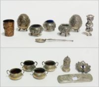 A quantity of foreign silver to include cruet leaf, bell, oriental silver cover etc.