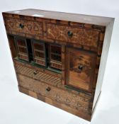 Japanese marquetry inlaid table display cabinet, with inset cricket cage and an arrangement of