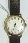 A Bravington's nine carat gold cased gentleman's wrist watch with silver dial, and subsidiary second