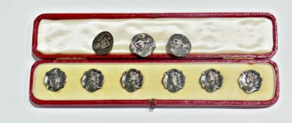 A set of foreign silver Art Nouveau influenced buttons, a boxed set of six with three further