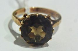 9ct gold and smoky quartz dress ring, set large circular cut stone in claw setting