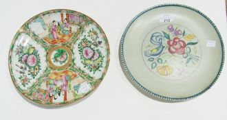 Poole pottery plate, foliate decoration on a green ground, and an oriental plate (2)