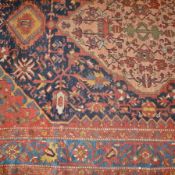 An old eastern wool rug with large lozenge-shaped medallion on midnight blue field, having allover