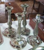 Pair EPNS table candlesticks, with circular bases and fluted baluster columns, removable drip