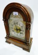Late nineteenth century oak cased Ansonia mantel clock, 37cm high