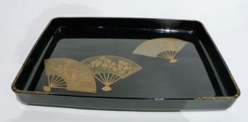 Black lacquer tray, decorated in gilt, silver and coloured fans, in original box, with maker's