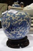 Chinese porcelain vase and cover, ovoid, decorated with fish in underglaze blue, four character mark