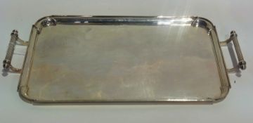 A George V rectangular silver tray, with twin handles, London 1913, weight 69ozs approx, width