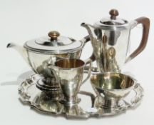 Silver Art Deco style four-piece tea service of plain form, raised on circular foot, Birmingham 1963