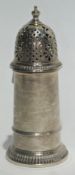 A silver sugar sifter of cylindrical form, on circular foot, Birmingham 1965, height 16cms, 6 oz